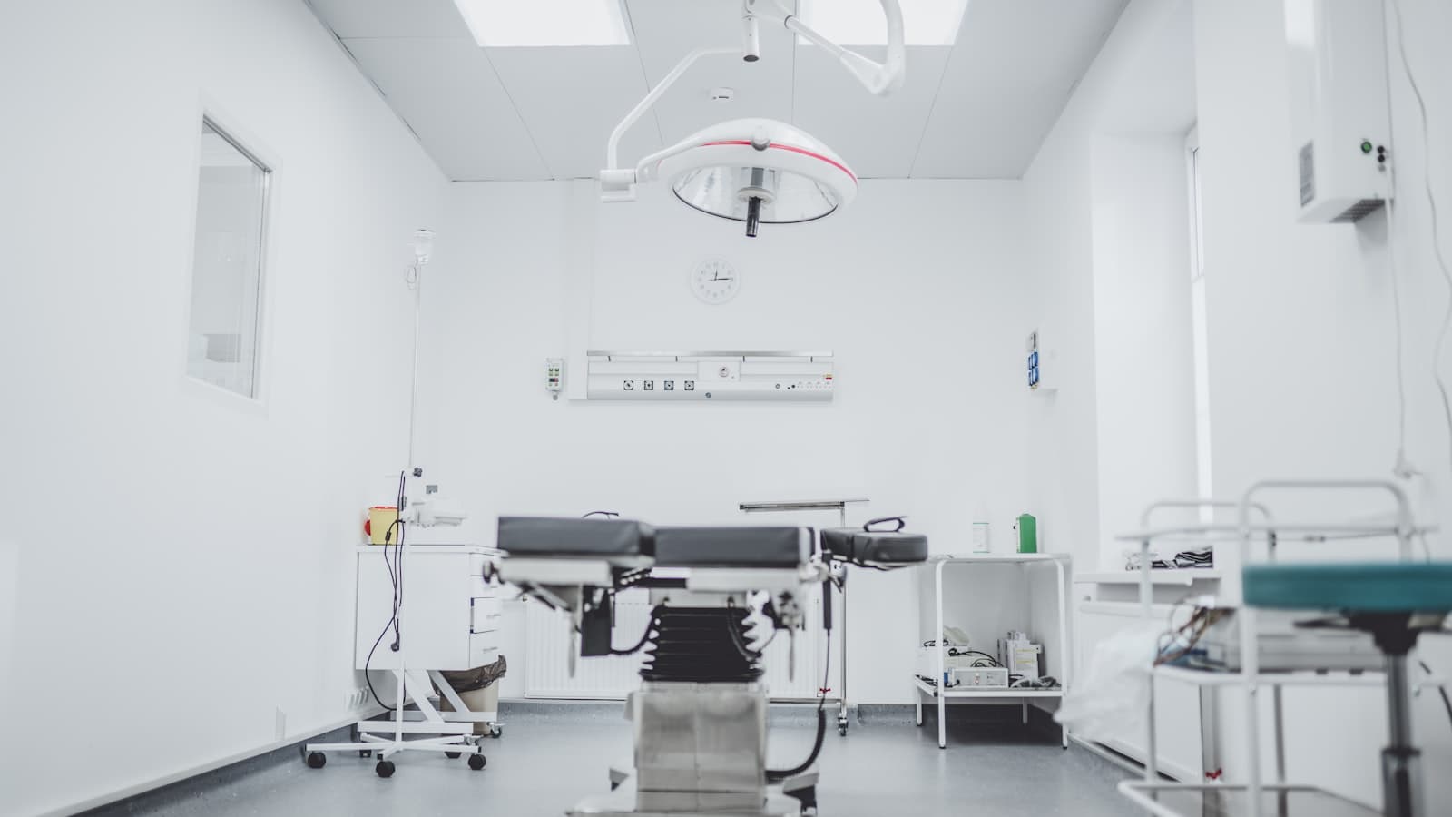 A surgical team in scrubs viewed from below