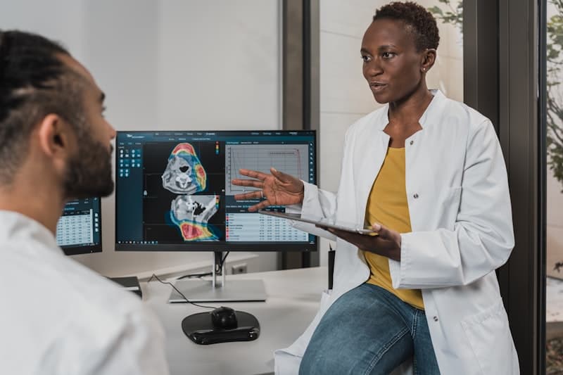 Two clinicians reviewing a patient scan together
